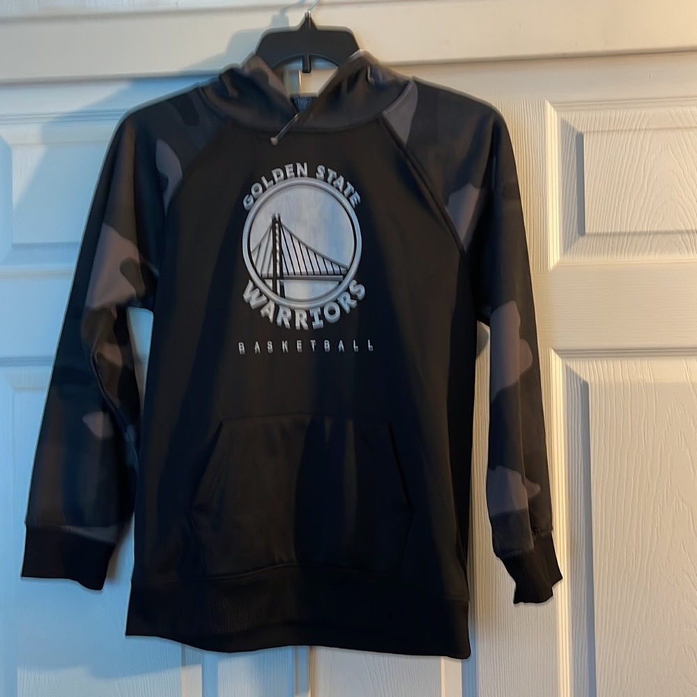 Selling a Golden State Warriors sweat shirt.